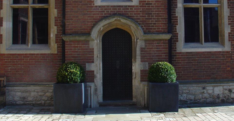 Box balls in polystone cubes by old doorway