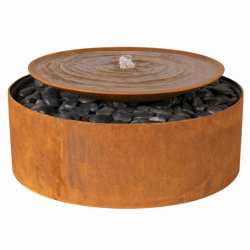 Raised corten steel water feature and fountain supplied with black river pebbles