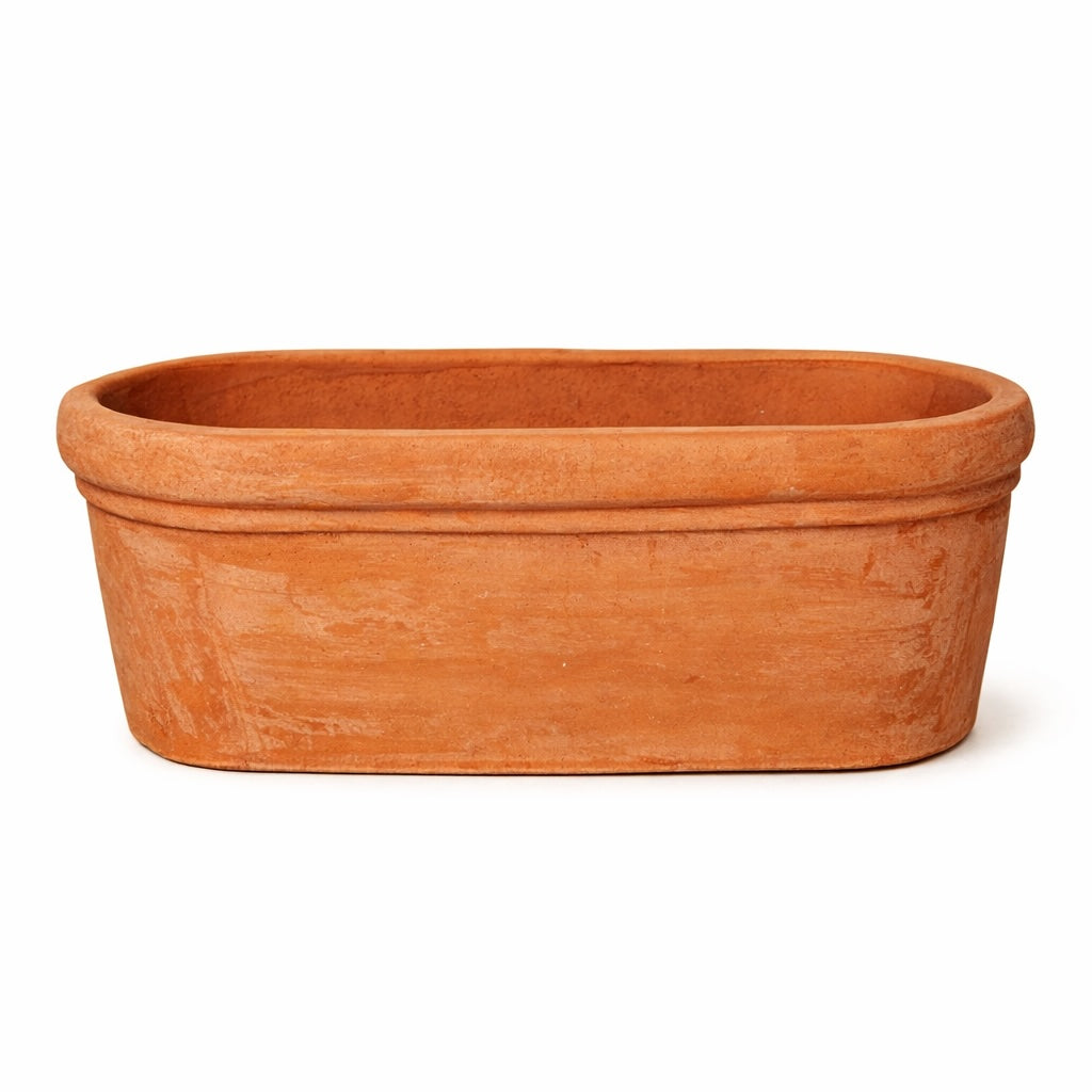 Handcrafted terracotta oval trough planter with rich golden terracotta patina for luxury garden and windowsill planting
